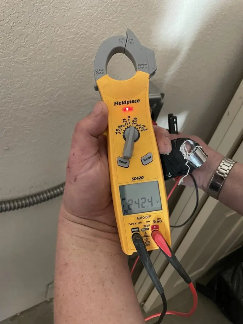 Voltage testing with clamp meter during Generator Installation in West Park